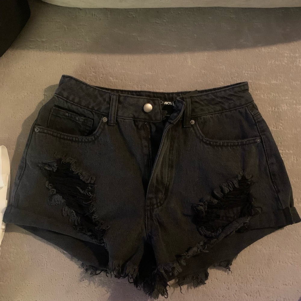 Super cute distressed black shorts from fashion nova! New with tags.